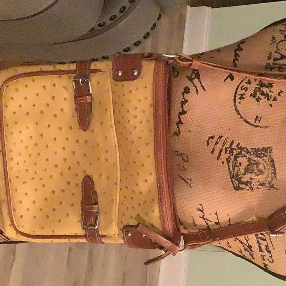 Boutique ostrich look bag. In very good condition. Measures 9 1/2 x 10 x 2